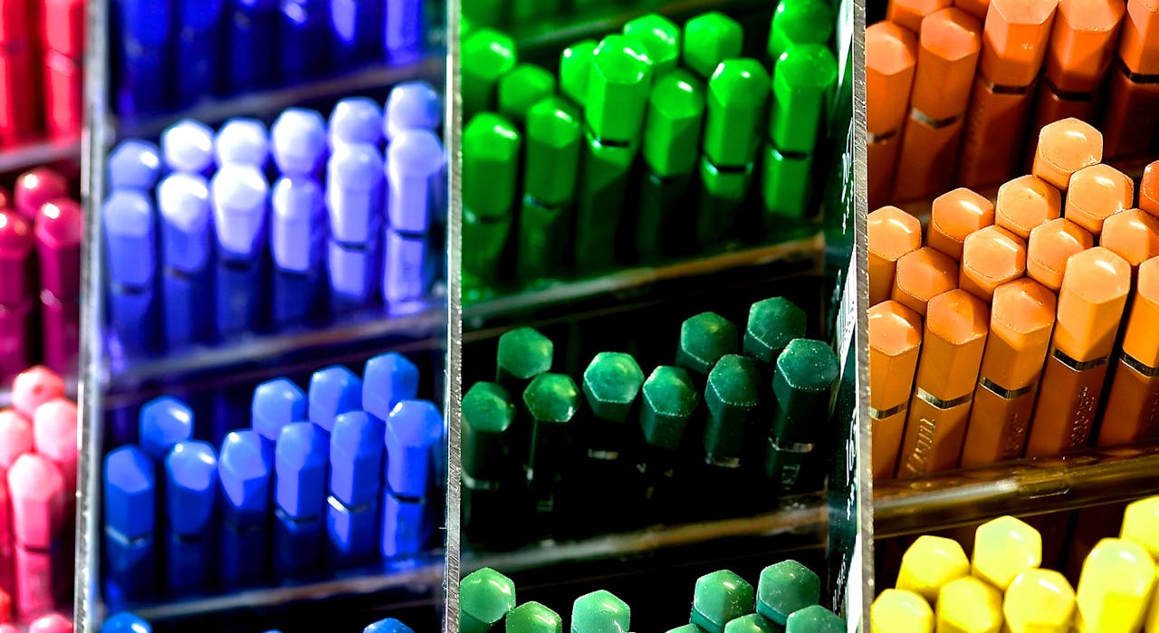 Colorful array of pencils in a store display, showcasing vibrant shades.